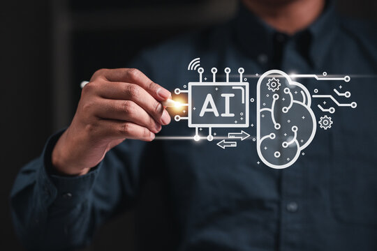 Businessman touching on AI machine learning on virtual screen with big data.