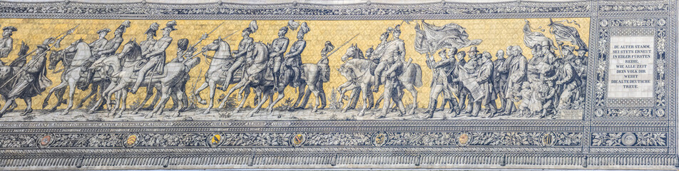 Fototapeta na wymiar The Fürstenzug in Dresden, Germany, is a large mural of a mounted procession of the rulers of Saxony