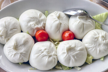 Dish of burrata, a type of mozzarella from Puglia. Dairy products, cheeses