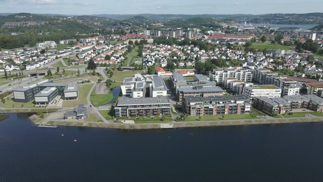 A well-laid out community along the Otra River in Kristiansand Norway