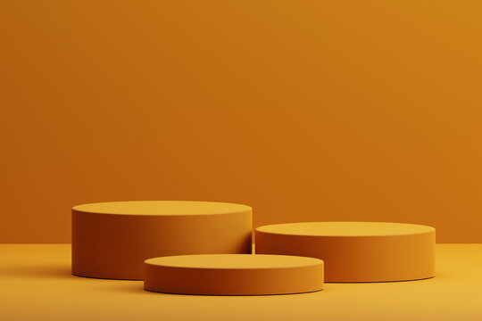 3D rendering orange minimal concept triple cylinder pedestal or podium for product showcase display on empty background. 3D mockup illustration