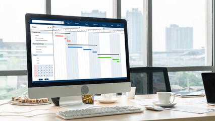 Project planning software for modish business project management on the computer screen showing...