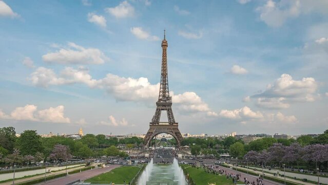Paris France time lapse 4K, city skyline timelapse at Eiffel Tower and Trocadero Gardens