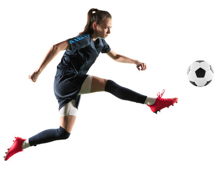 Young sportive woman, professional football, soccer player in motion, kicking ball isolated on transparent background. Concept of professional sport, competition, hobby, action and motion