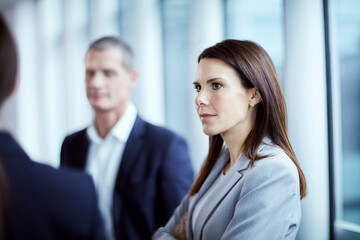 Fototapeta premium Serious businesswoman listening in meeting
