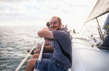 Portrait smiling man sailing on sailboat