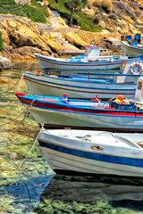Colorful fishing boats in Greece - 614768339