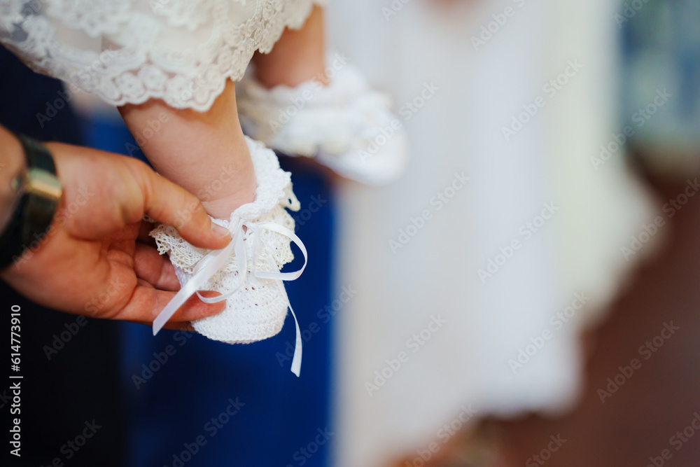 Canvas Prints Cute details of the ritual of baptism in the Orthodox Church. 