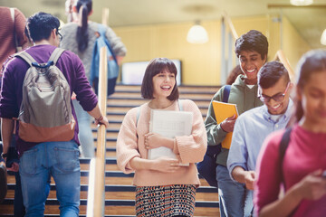 Smiling college students on stairway