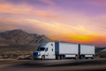 Obraz na płótnie Canvas Semi Trucks on road, USA. Trucking in Nevada, USA
