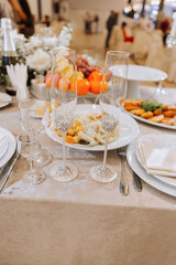 catering food table set decoration. Background. The foreground of napkins, dishes, toast, glasses. Calm atmosphere