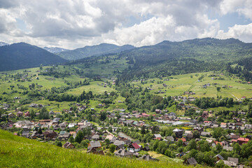 Fototapeta na wymiar landscape with mountains and meadow