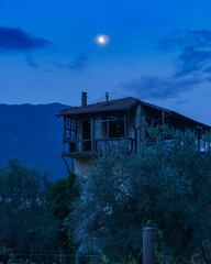 derelict house in the night
