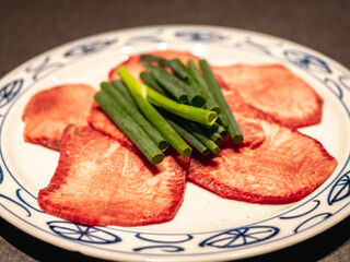 Wagyu beef tongue sliced. Premium Slices Wagyu A5 beef with high-marbled served for yakiniku. Wagyu tongue beef serve at restaurant for customer to enjoy cooking.