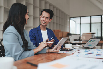 Fund managers team consultation and discuss about analysis Investment stock market by digital tablet