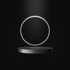 Circle black podium, decoration with neon light white round design on dark background.