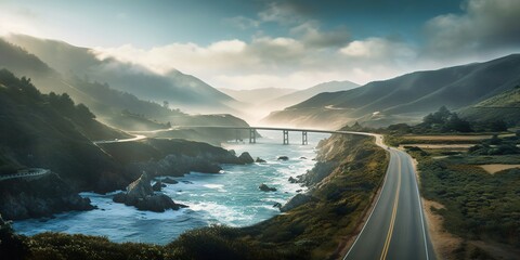 The coastal meandering road extends alongside the shore, following the sinuous coastline, tracing the curving edge of the sea.