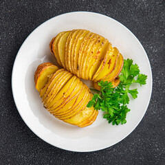 baked potato accordion vegetable slice healthy meal food snack on the table copy space food...