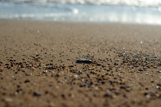 Sea waves on a sand beach