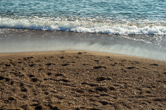 Sea waves on a sand beach