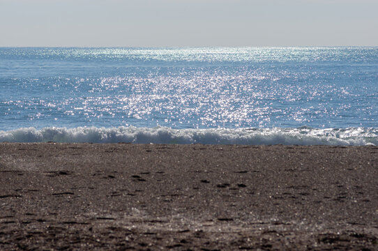 Sea waves on a sand beach