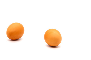 Chicken brown eggs on a white background.