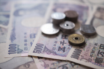 Japanese Yen money. close up of the Japanese yen on hand. currency of Japan that is used to change, buy, sell, accumulate, invest, financial, exchange rate, value, accounting, international exchange