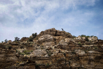 Looking up at a rocky mountain peak in the Sonora Desert, Arizona