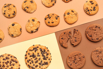 Tasty cookies on color background