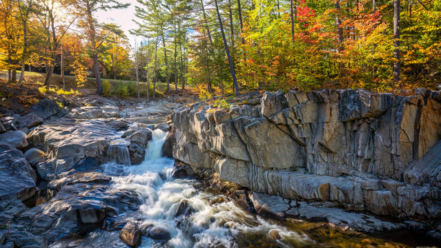 Rangeley Lakes Scenic Byway - Coos Canyon waterfall and rapids in Autumn on the Swift River - Maine.  