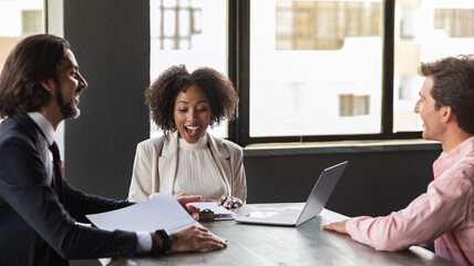 Fototapeta premium Happy multiracial team coworkers have meeting at office