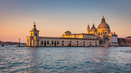 The Grand Canal in Venice with the Santa Maria della Salute basilica at a beautiful sunrise, Italy, Europe.