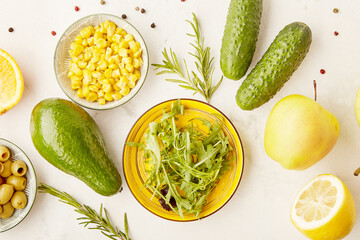 Low fodmap vegan menu ingredients - vegetables, fruits, greens. Keto, paleo, plant based diet concept with copy space. Flat lay. Yellow and green colours