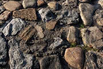Texture of stones on the ground. Ancient architecture.