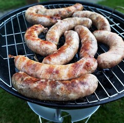 sausages on the grill