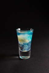 alcohol coloured cocktails with lights