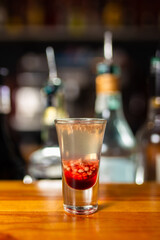 alcohol coloured cocktails with lights