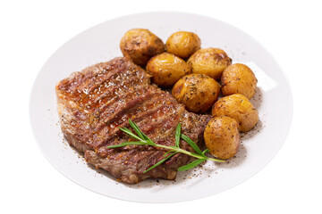 plate of  grilled meat with rosemary and potatoes isolated on transparent background
