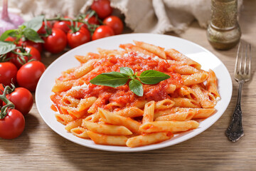 plate of pasta with tomato sauce