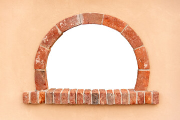 Antique brick arch window on plastered wall. Elements of architectural decoration Red brick frame. Copy space...