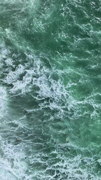 Vertical Video: Serene Slow-Motion Sea Waves with Airy Background
