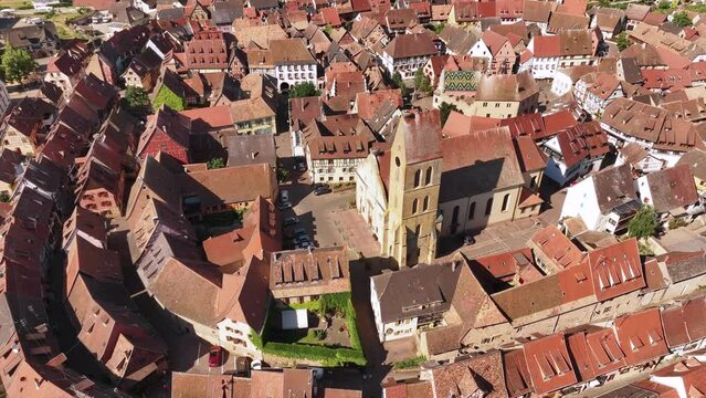 Aerial Drone Shot of Eguisheim village in the Alsace province, France. Picturesque village in a Sunny Summer Day