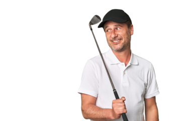 Middle aged golfer man looks aside smiling, cheerful and pleasant.