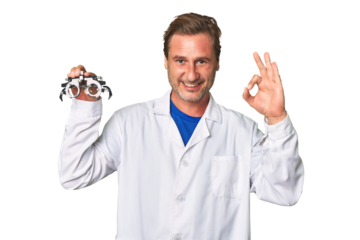 A middle-aged optometrist man cheerful and confident showing ok gesture.