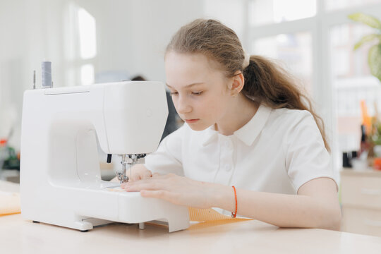 Smiling Small Girl Dressmaker, By Step Sewing Master Class In School