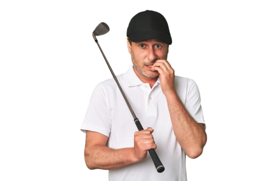 Middle aged golfer man person pointing by hand to a shirt copy space, proud and confident