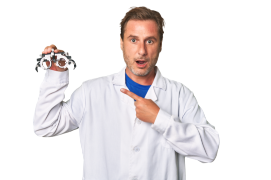 A middle-aged optometrist man pointing to the side