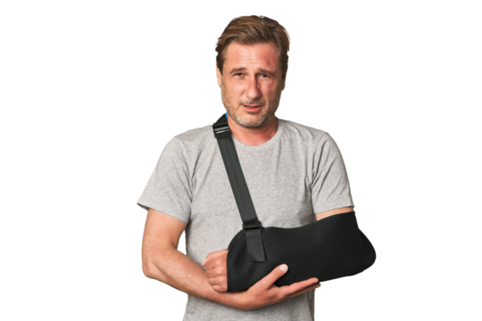 Despite injury, this resilient middle-aged man shows fortitude in this studio portrait, inspiring strength and determination.