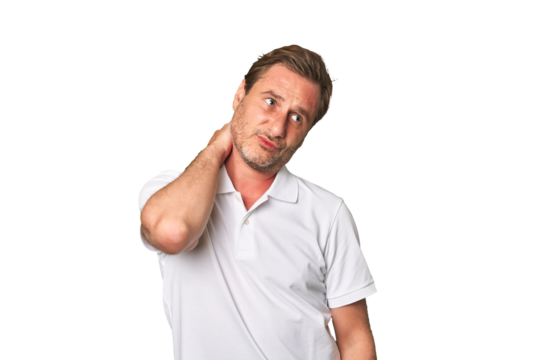 A middle-aged man isolated touching back of head, thinking and making a choice.