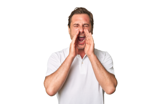 A middle-aged man isolated shouting excited to front.